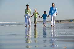 photo of family on the beach